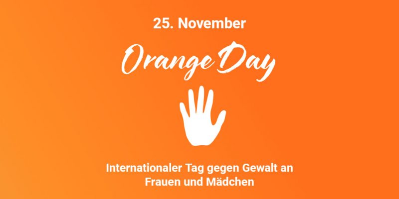 25. November, Orange Day mit einer Hand, Internationaler Tag gegen Gewalt an Frauen und Mädchen auf orange farbenen Hintergrund.